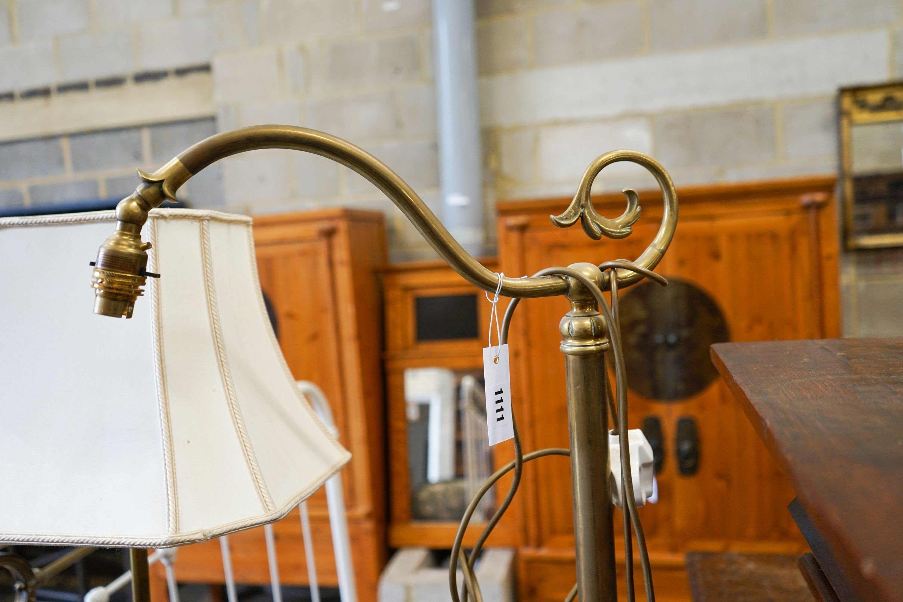 Two early 20th century copper and brass standard lamps, larger height 169cm